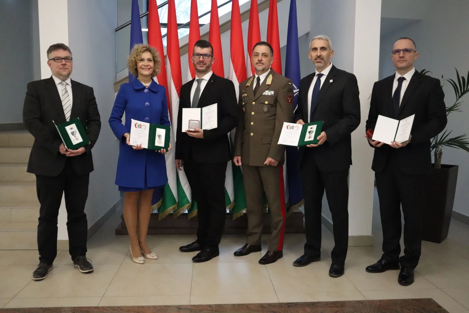 Professor Dr Gergely Gosztonyi, Senior Research Fellow; Dr Eszter Lukács, Vice-President for International Affairs and Strategic Relations of Széchenyi István University; Lieutenant Colonel Dr Ádám Farkas, Senior Research Fellow; Major General Norbert Tajti, Director General of the Military National Security Service; Associate Professor Dr Róbert Bartkó; and Lieutenant Colonel Dr László Vikman, Assistant Lecturer, at the ceremony